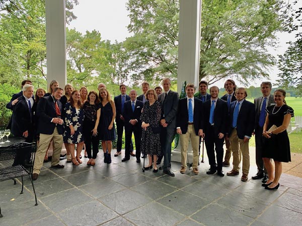 Alumni, actives, friends, and family of Harry Marshall at the Chevy Chase Club following Harry's funeral.