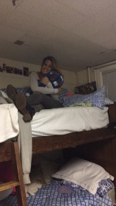 Alumni Shannon Boyles, ’14 visiting her old theta bed on Homecoming weekend.