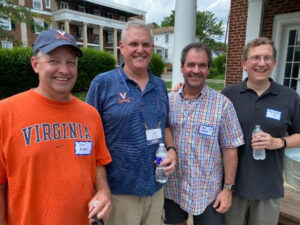 Four class of 1972 alumni at the Theta Chi Reunions tailgate